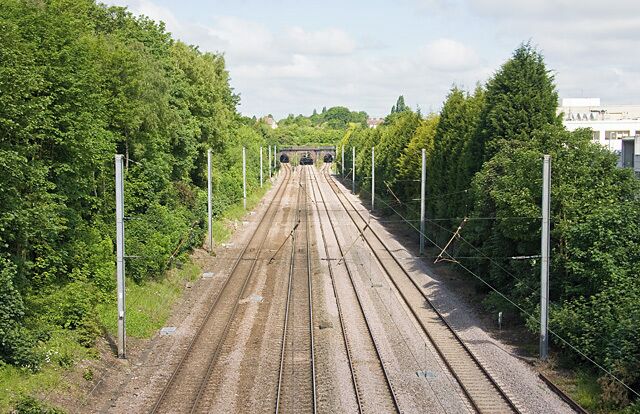 Mainline to Scotland The mainline from Kings Cross passing through Brunswick Park. In the distance is Barnet Tunnel (nowhere near Barnet!). Behind the trees on the right is the North London Business Park.