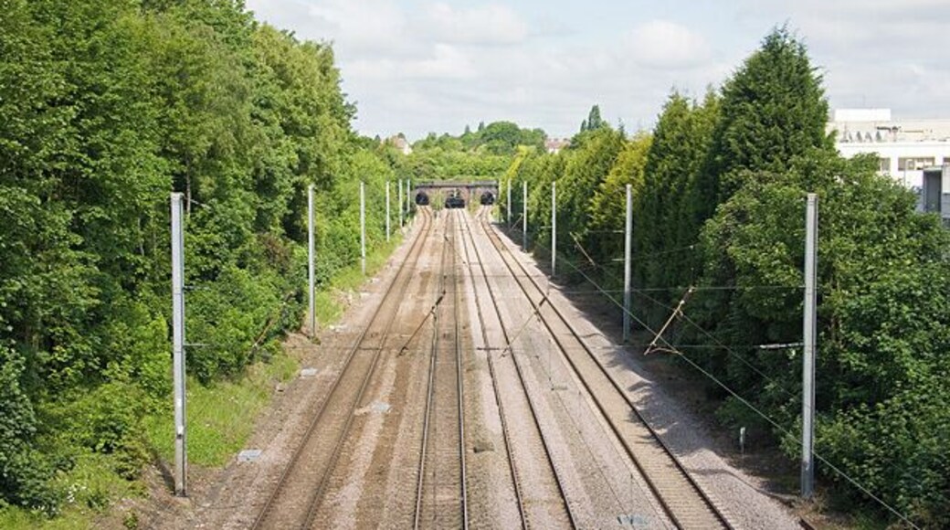 Mainline to Scotland The mainline from Kings Cross passing through Brunswick Park. In the distance is Barnet Tunnel (nowhere near Barnet!). Behind the trees on the right is the North London Business Park.