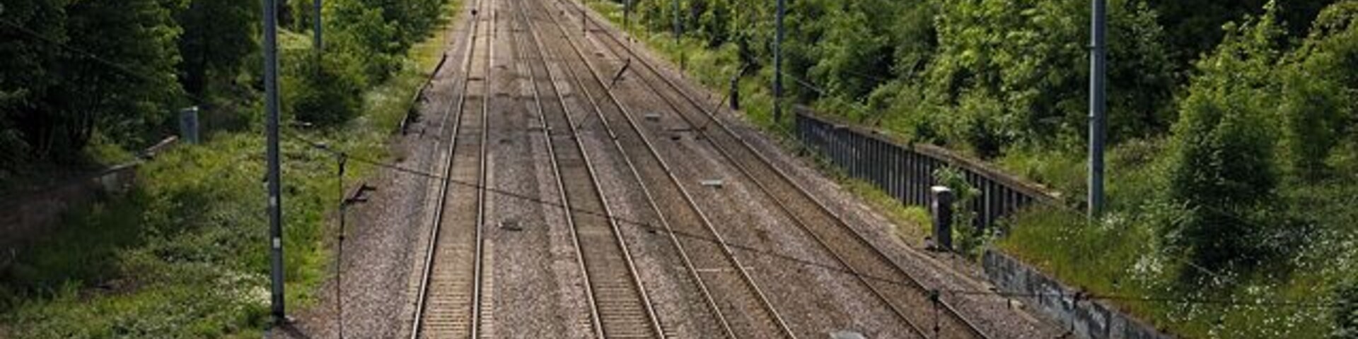 Kings Cross Mainline The mainline from Edinburgh to London passing through Brunswick Park. This view is looking from Oakleigh Road towards New Southgate. The bridge in the distance carries Friern Barnet Road.