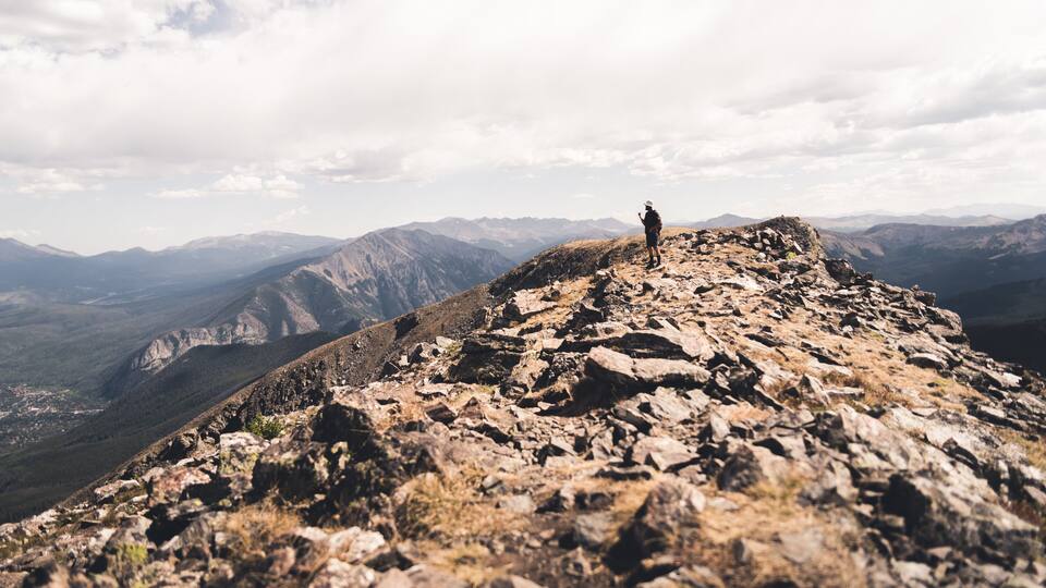 A man on the top of Buffalo Mountain near Silverthorne, Colorado.