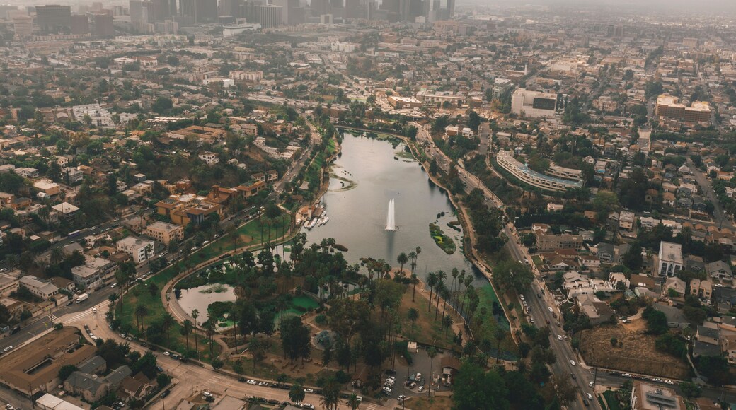 Echo Park in Los Angeles with View of Downtown Skyline and Foggy Polluted Smog Air in Big Urban City
