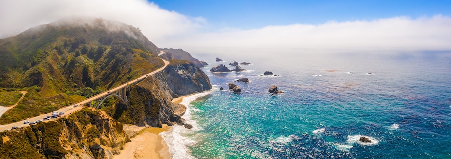 Arial view of the California Bixby bridge in Big Sur in the Monterey County along side State Route 1 US, the ocean road.