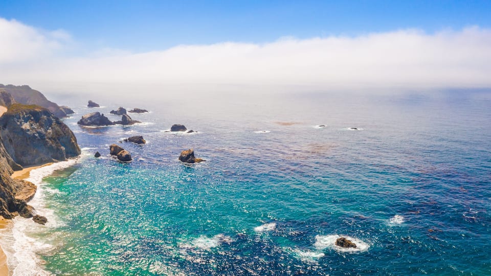 Arial view of the California Bixby bridge in Big Sur in the Monterey County along side State Route 1 US, the ocean road.