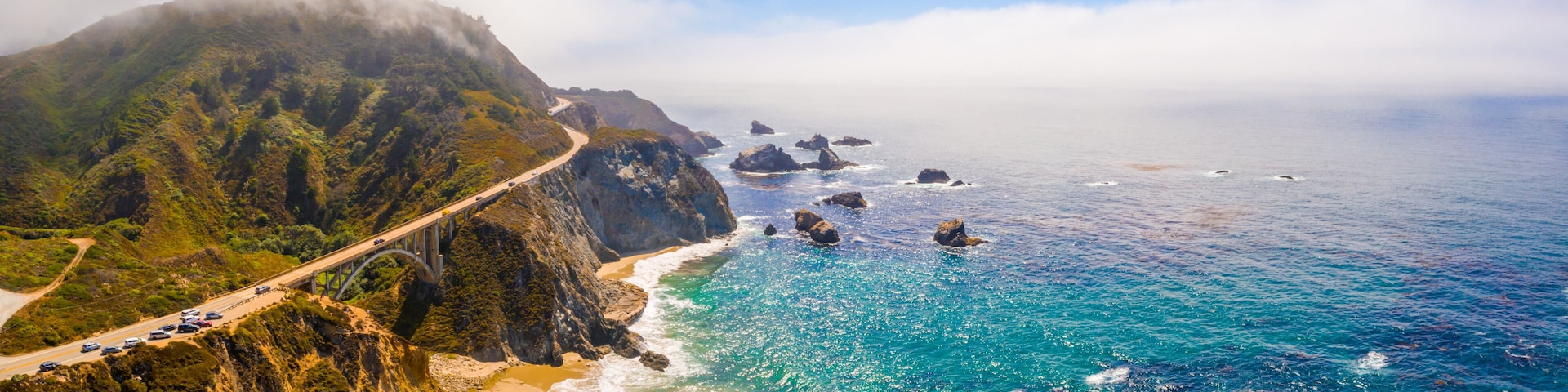 Arial view of the California Bixby bridge in Big Sur in the Monterey County along side State Route 1 US, the ocean road.