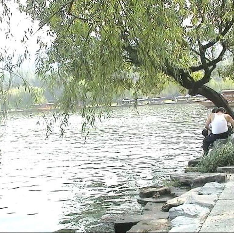Xihu means West Lake, beautiful lake, Spring will be the best time to visit.