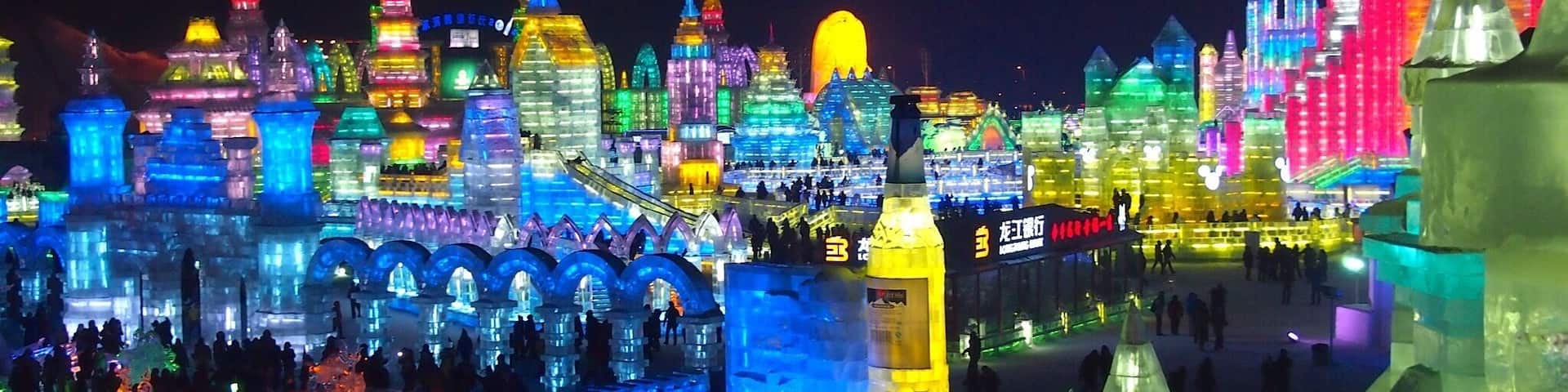 Harbin Ice Festival. Ice sculptures with LED lighting are magnificent, but freezing cold.