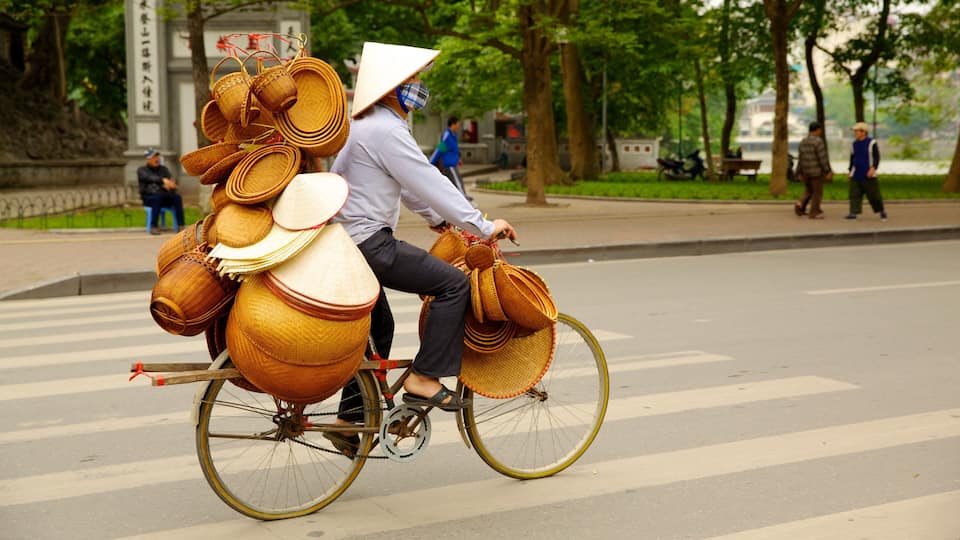 Hoan Kiem which includes street scenes and cycling as well as an individual male