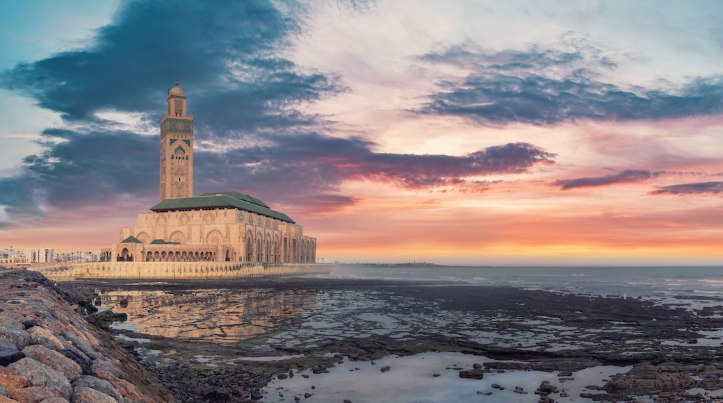 Casablanca, Morocco -April 2023: The Hassan II Mosque during sunset. Impressive architecture and intricate details showcase the country's rich cultural heritage and religious devotion.