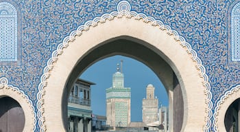 Fes, Morocco - ornate city gate of Fes el Bali, the old city, called Bab Bou Jeloud, a big blue gate in Fes, Morocco. It's like a grand entrance to the old part of the city.