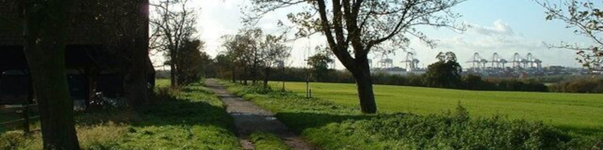 Entrance to Trimley Marshes The entrance to Trimley Marshes with Felixstowe docks in the background.