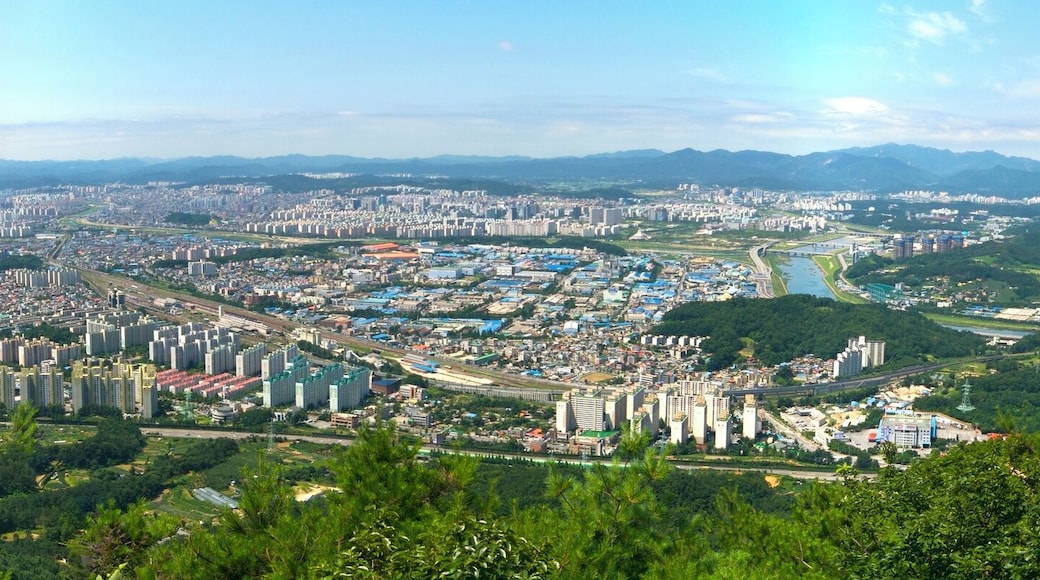 Cityscape of the metropolitan city of Daejeon, South Korea. This is a panorama of three photograhs stitched together using Hugin. The photographs were taken from Bonghwangjeong at Gyejoksan, a nearby mountain, using a 20mm focal length (crop factor 1.5) with aperture f/11.