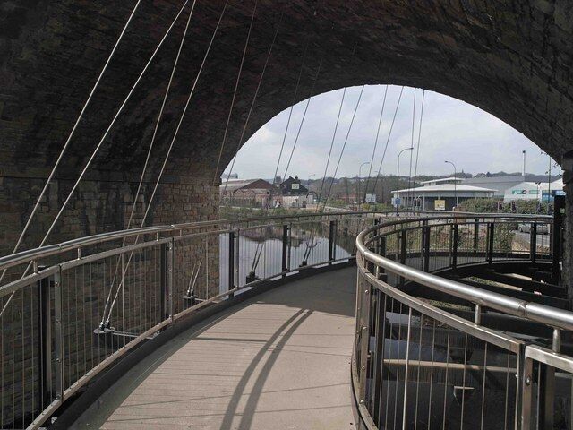 Suspended walkway under Norfolk bridge On the 5 weir's walk Sheffield.