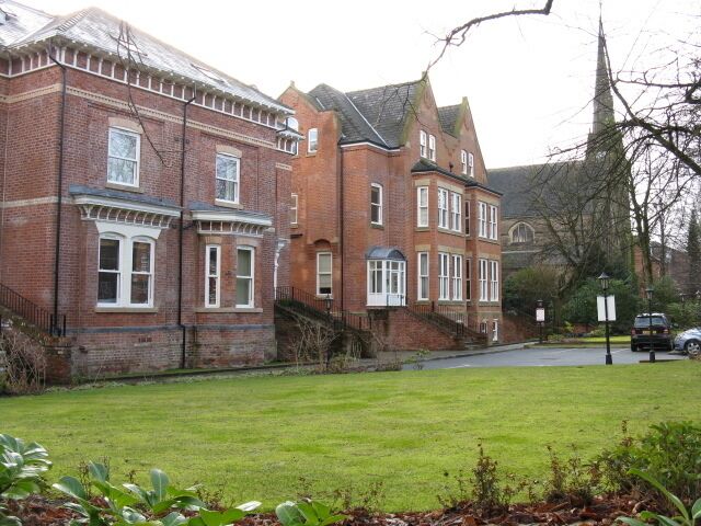 Property on Heaton Moor Road, Heaton Chapel Large Victorian houses next to the parish church are now offices.