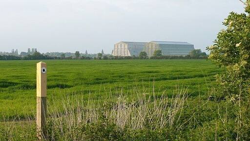 Bridleway marker and cereal field. Taken from the John Bunyan Trail with 767071 prominent in the distance.