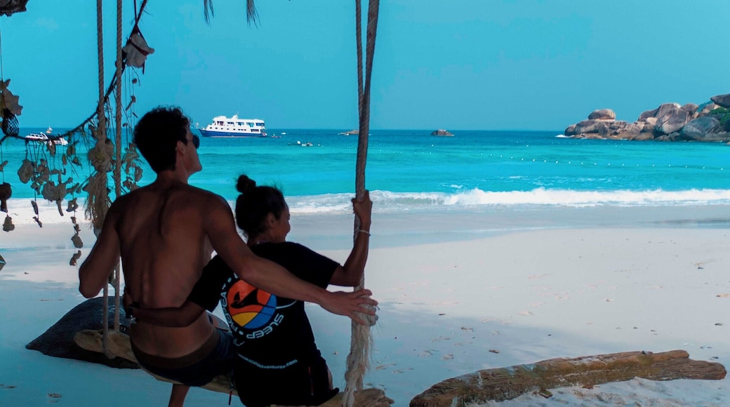Happy scuba divers enjoying a few hours on the beautiful beach on Sail Rock Island, part of Similan National Park, Thailand.
#EndlessSummer