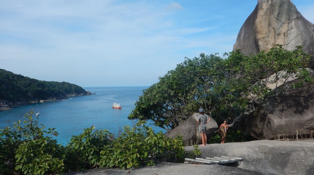 During a liveaboard in the Similans we stopped at an island with a Donald Duck faced rock. You can climb up to this viewpoint. It is amazing!