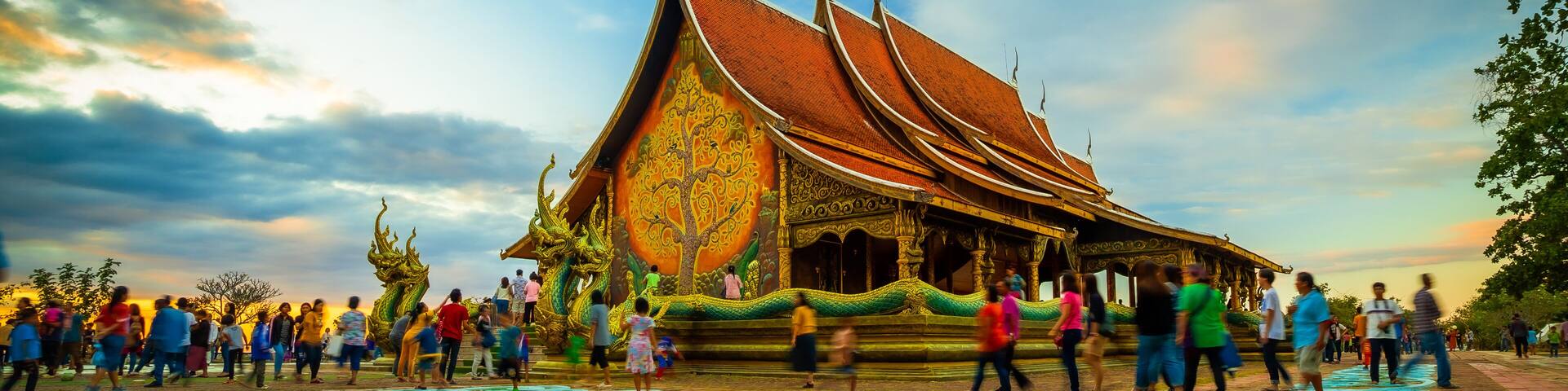 Thais bring families to visit Sirinthorn Wararam Phupha Temple (Wat Phu Phrao) in the evening. Very beautiful temples near the Thai-Lao border town of Chong Mek in Sirindhorn district, Ubon Ratchathan