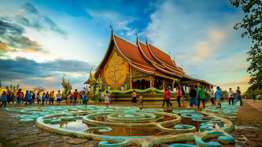 Thais bring families to visit Sirinthorn Wararam Phupha Temple (Wat Phu Phrao) in the evening. Very beautiful temples near the Thai-Lao border town of Chong Mek in Sirindhorn district, Ubon Ratchathan
