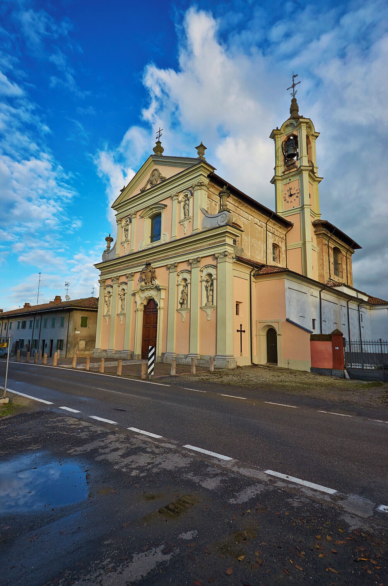 A historic church with a bell tower and a clock.