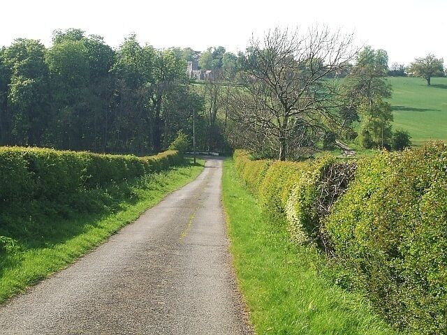Lane from Battlesden to its Church This is an uncharacteristically straight bit of the lane through Battlesden to its church. The church can just be seen directly ahead but in a somewhat elevated position.