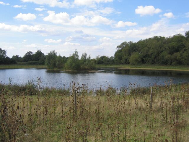 Water-filled gravel pit, Cople, Beds. in the Gt Ouse valley SE of Bedford.