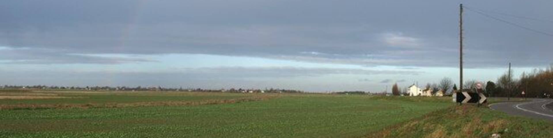 Cowbit Barrier Bank To the left is Cowbit Wash and the barrier bank carries the road on top of it.