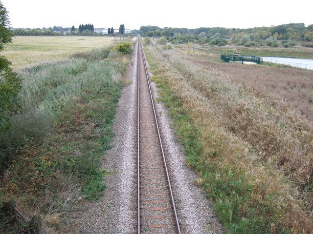 Freight rail to Kings Lynn This single track runs from a quarry in Leziate to Kings Lynn and is/was used to carry sand for glass making. Judging by the state of the rusty rails it is not used very much.