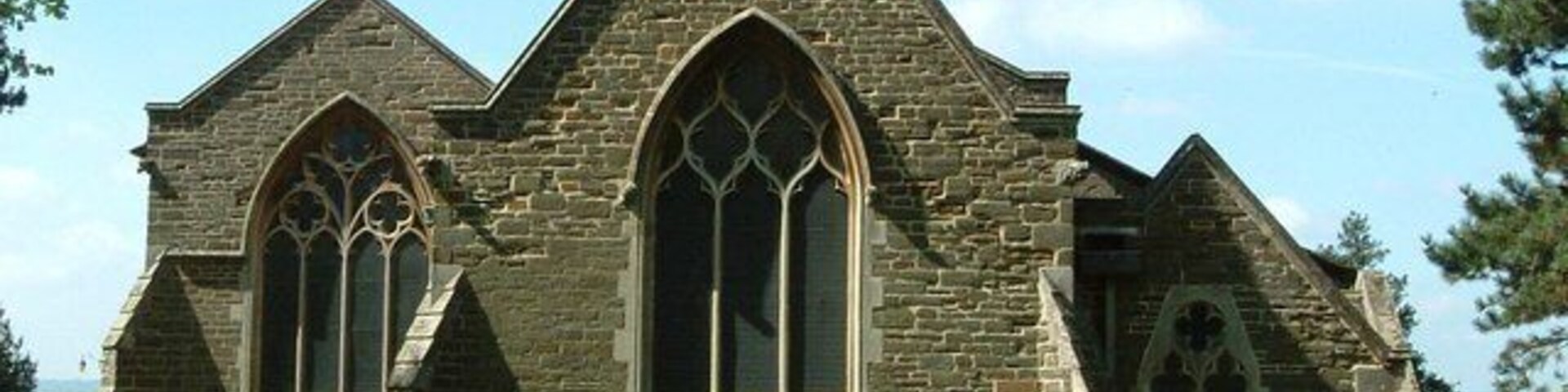St. Mary's, Maulden : Eastern end. The oldest parts of this church date from the C13th, but it was enlarged and partly rebuilt in 1859. The cost of this building work was largely borne by the Rector of the time, Charles Ward and the Duke of Bedford. This church is built in the local chocolate-coloured stone (Cf. 136209 and 155592 )