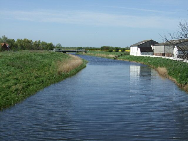 Vernatts Drain Drainage Channel to the north of Spalding, named in honour of one of the engineers who devised the draining of the fens. This view is looking west from the road bridge on the B1356.