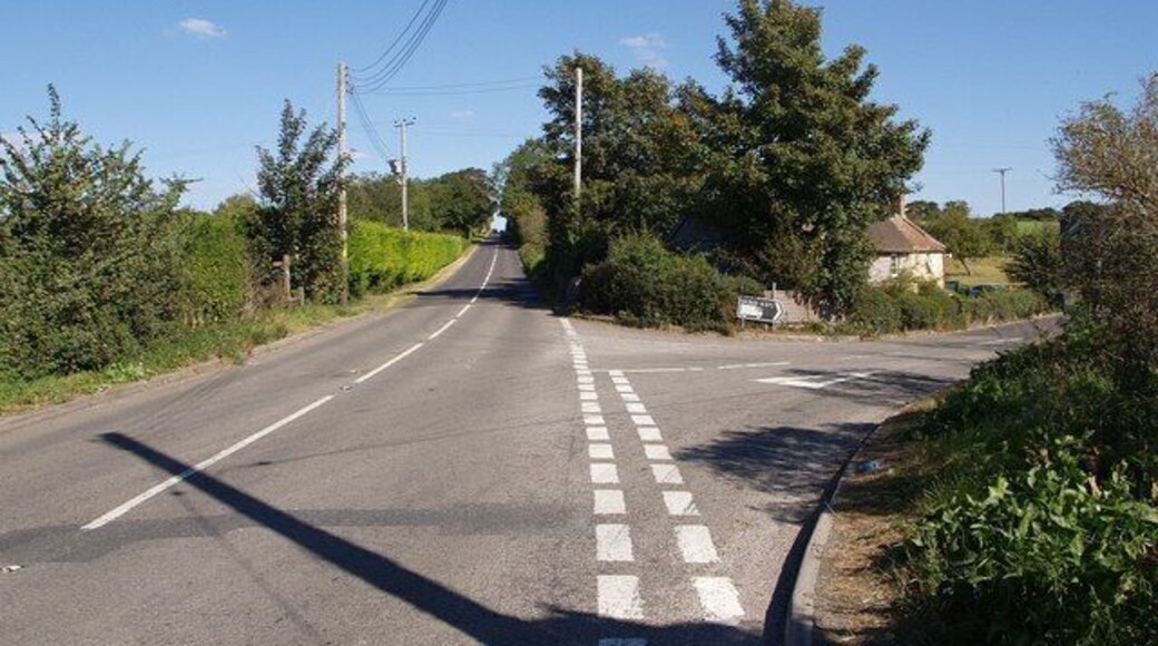 B3153 at Tengore Lane. The junction referred to in 560542; the B road is heading from Langport to Somerton and the side road links across to the A372 and thence the A303. Bridge Cottages are in the angle between the roads.