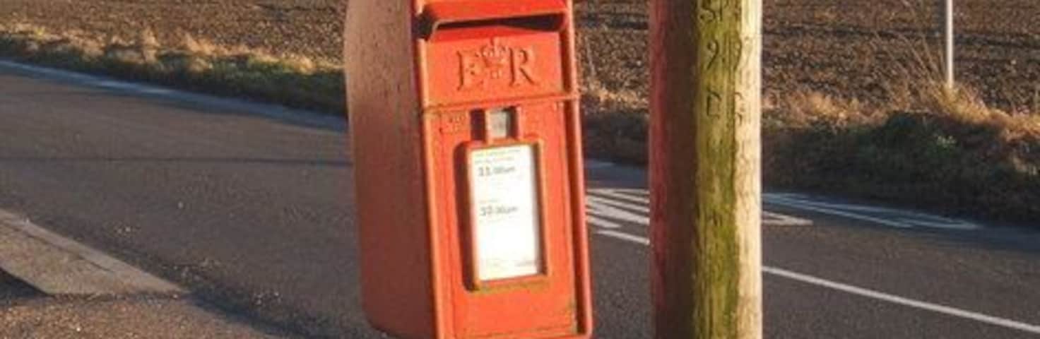 Postbox near Ringshall Very close to gridline, but looking into the square.