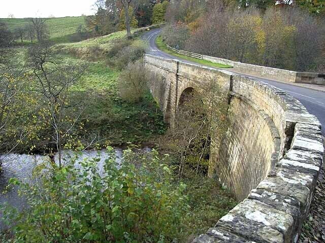 Bridge over the Hart Burn A fine bridge on the B6343 Morpeth to Scots Gao road just east of Hartburn village.