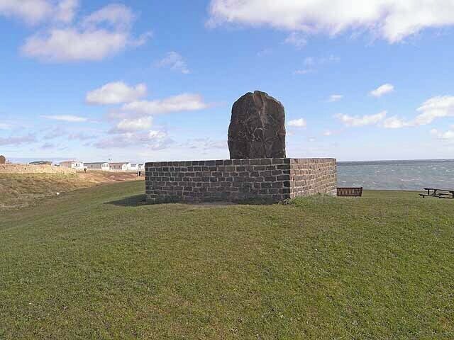 Time capsule monument, Newbiggin-on-Sea Beneath this monument is a time capsule containing mementoes of 20th century life created by children from Newbiggin. Installed on 9 September 2000, the capsule is due to be opened a hundred years later.