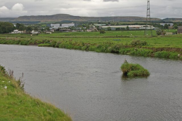 Tiny island in the River Calder This is a few yards downriver from where the true line of the footpath (FP52) crosses the Calder at a ford, it then crosses back again using another ford. Most people just follow the bank and don't go wading.