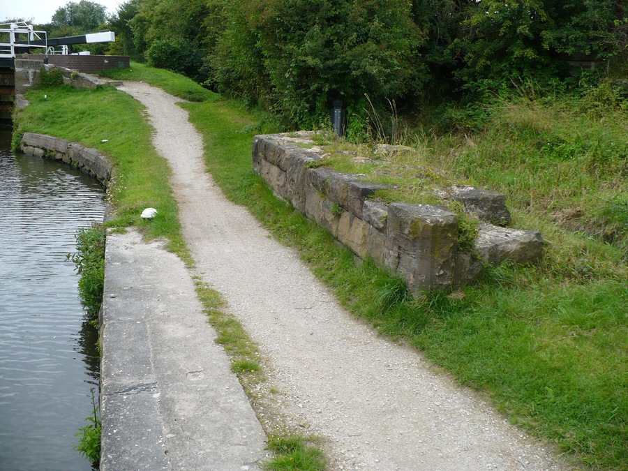 Remains of bridge, Eastwood Lock Remains of an old bridge by Eastwood Lock on the Erewash Canal. The Erewash Valley was a key industrial site, with the canals and railways linking here, plus at least one colliery by the Erewash River. This bridge used to carry one of the railways linking the canal, the colliery and the main rail network.