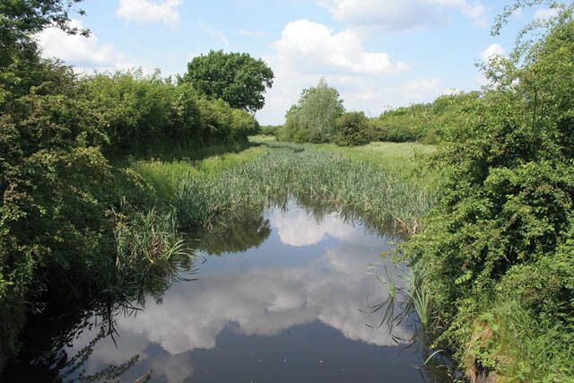 Nottingham Canal Nature Reserve. This section of the Nottingham Canal is in water and this has many ducks, coots and moorhens all of which made a hasty retreat when they saw me approaching! The Nottingham Canal was a 14.75 mile (23.6km) long canal between Langley Mill in Derbyshire and Nottingham to supplement the adjacent Erewash Canal (see 832810). It opened in 1796 carrying coal from the coal fields to the City of Nottingham, the River Trent and beyond. With the advent of the railways canal traffic declined and the canal was closed in 1937. The southern section is now part of the River Trent Navigation. Since 1977, the Broxtowe Borough Council has owned and maintained the upstream sections from Wollaton to Langley Mill as a nature reserve and walking trail.
