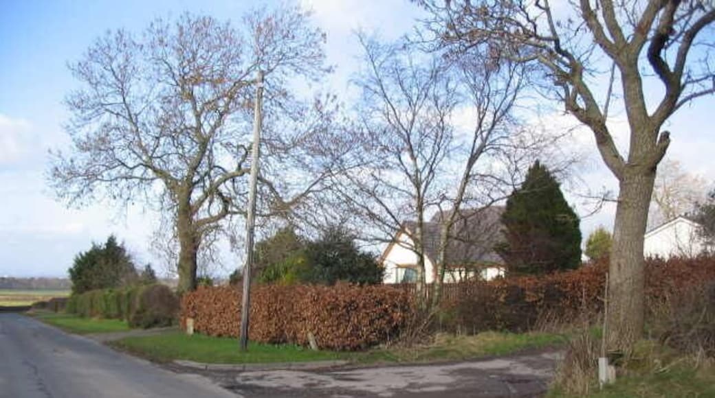 Low Burthwaite A view looking to the north towards Low Burthwaite and the entrance (right) to the track to Burthwaite Hill.