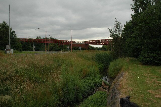 Foot Bridge over A574, Westbrook, Warrington. This foot bridge forms a large cross (as can be seen on the map) and the centre forms a roundabout on the A574, adjacent to Asda.