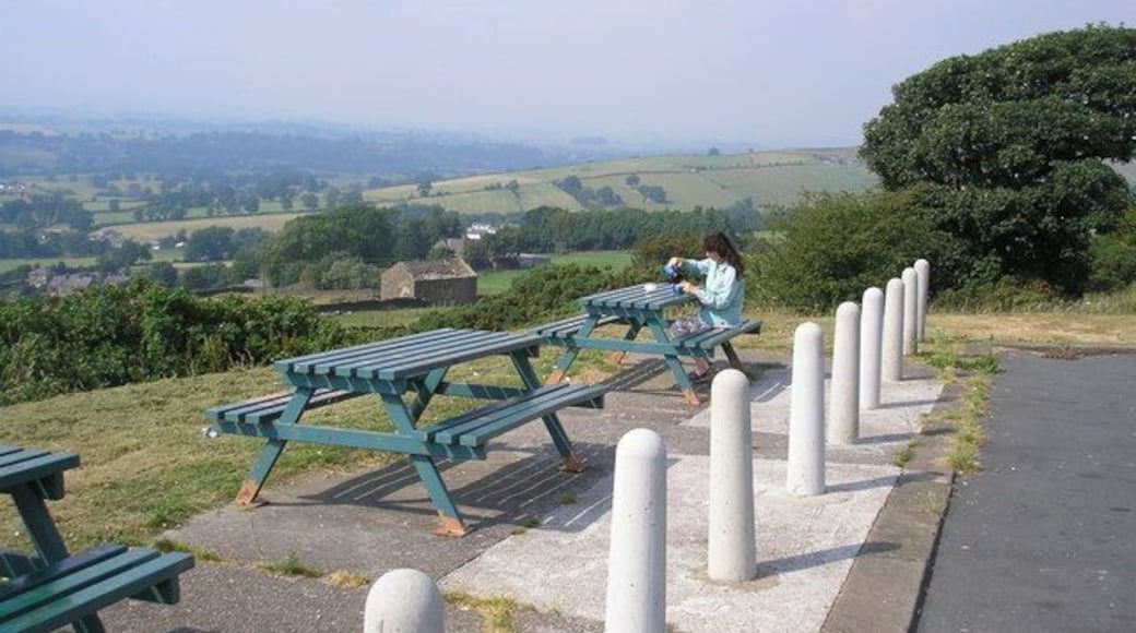 A picnic on Bleara Moor, Yorkshire. The minor road from the A56 at Earby to Lothersdale climbs steeply out of Earby to cross Bleara Moor, and at the crest of the hill the local authority have thoughtfully provided a pleasant picnic site with sturdy tables and car parking. The site has outstanding views over the surrounding countryside and is very popular.