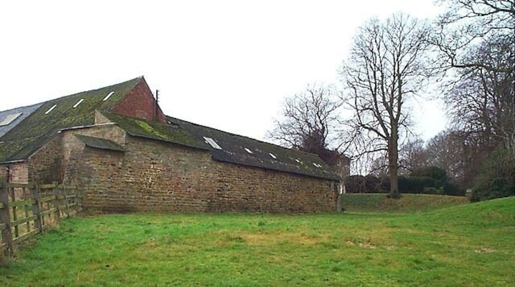 Greasley Castle Farm. Nicholas de Cantelupe's manor house stood close to the Church of St Mary (in the background of this image). He fortified the house and it became known as Greasley Castle. The remains of the fourteenth century building been incorporated into farm buildings still in use today.