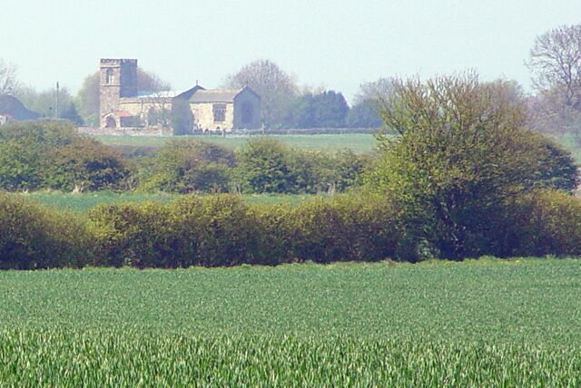 All Saints C. of E., Barmston, East Riding of Yorkshire, England. Looking across the fields from the Ulrome to Barmston footpath.