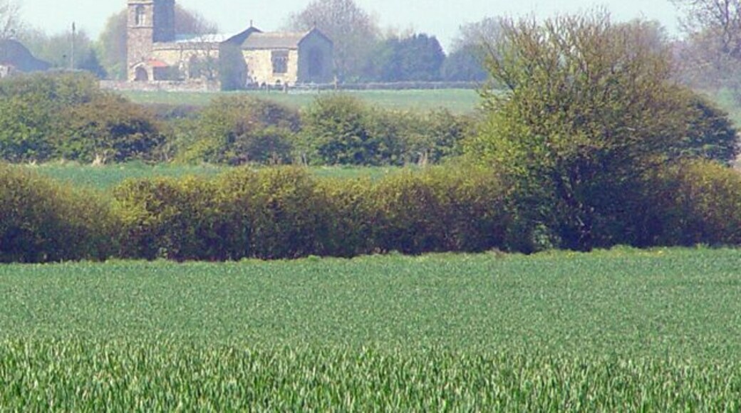 All Saints C. of E., Barmston, East Riding of Yorkshire, England. Looking across the fields from the Ulrome to Barmston footpath.
