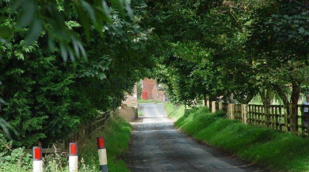 Lockington Road, Lund, East Riding of Yorkshire, England. This eastern approach to Lund takes you directly into the village centre, the BT telephone box being clearly visible.