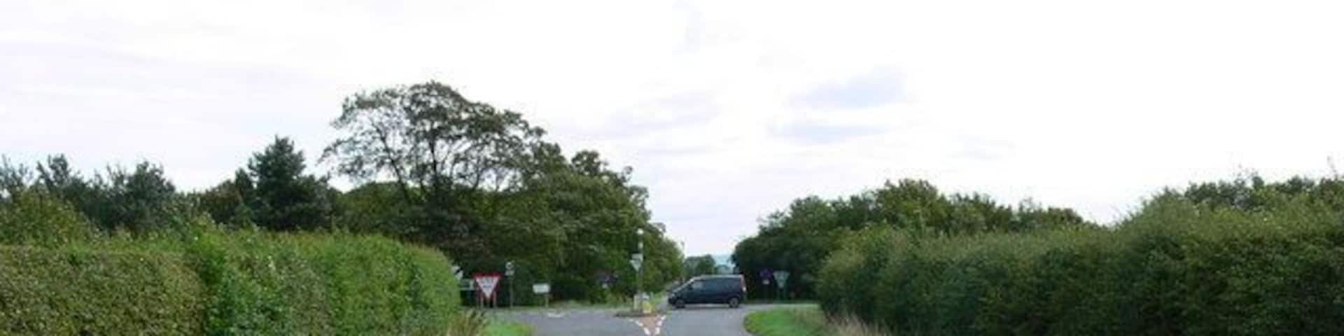 Cross Roads. This square is mainly farmland but the A 46 slices across the middle.