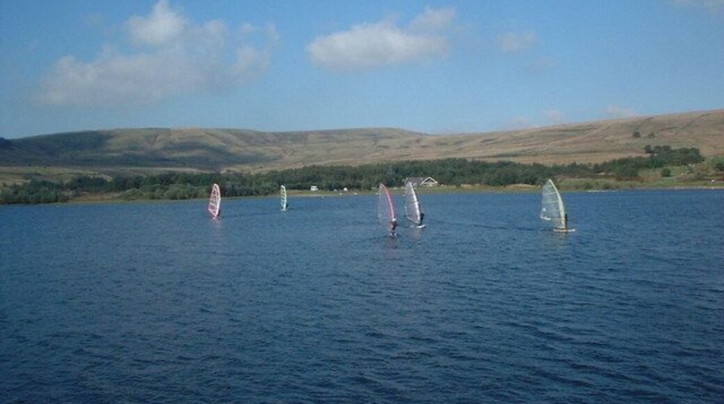 Watergrove windsurfers Taken from the reservoir dam, the subject is the windsurfers' clubhouse on the far side of the reservoir. Watergrove in winter: https://www.geograph.org.uk/photo/1701104