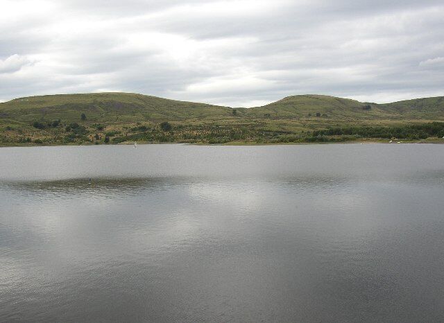 Watergrove Reservoir, Wardle. Although a dull day, the hills and clouds are reflected in the water.