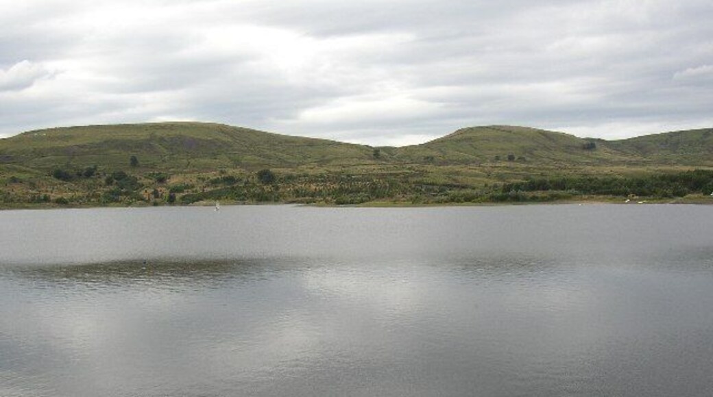 Watergrove Reservoir, Wardle. Although a dull day, the hills and clouds are reflected in the water.