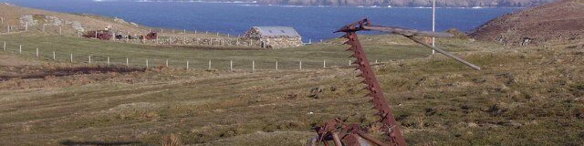 Old mower, Totegan. View east off Strathy Point