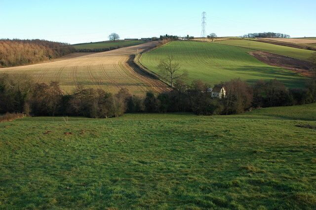 Farmland below Ramsden Farm In the bottom of the valley is Tar's Mill Cottage. A footpath descends to the cottage and then climbs the opposite side of the valley, firstly through a field and then it follows the track up to Ramsden Farm on the skyline.