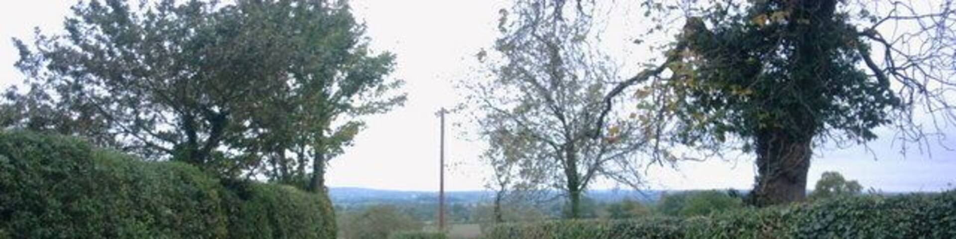 Country Lane, Butterhill, Stafford This un-named country lane at Butterhill leads to Penkridge. The lane to the right is a dead end where there is a farm and a Care Home for the elderly.